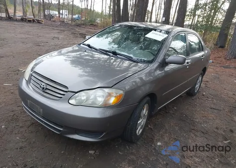 2004 Toyota Corolla Le z USA, uszkodzony, nr VIN 2T1BR32E54C183710